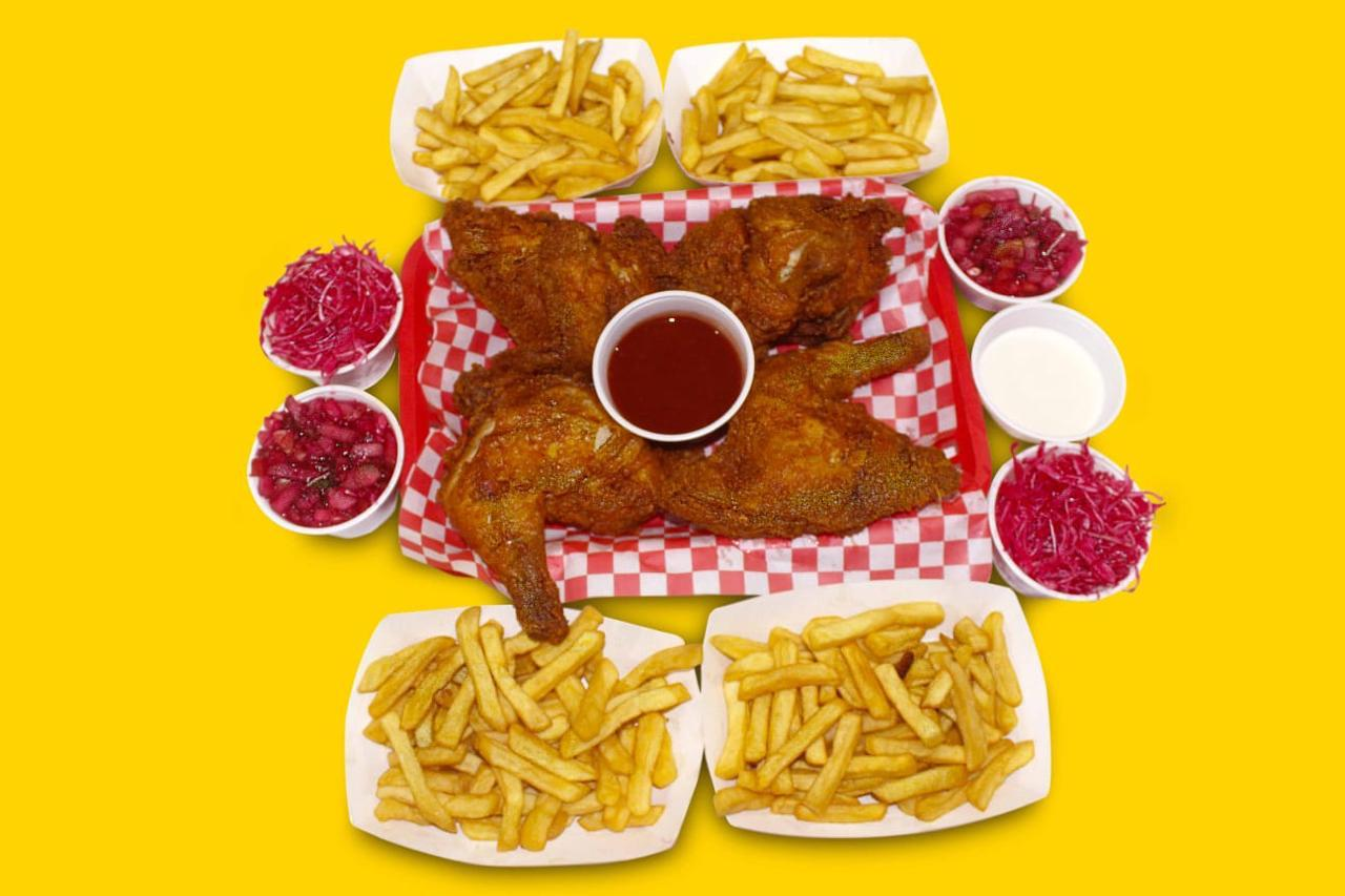 Pollo Entero + 4 Ordenes de Papas